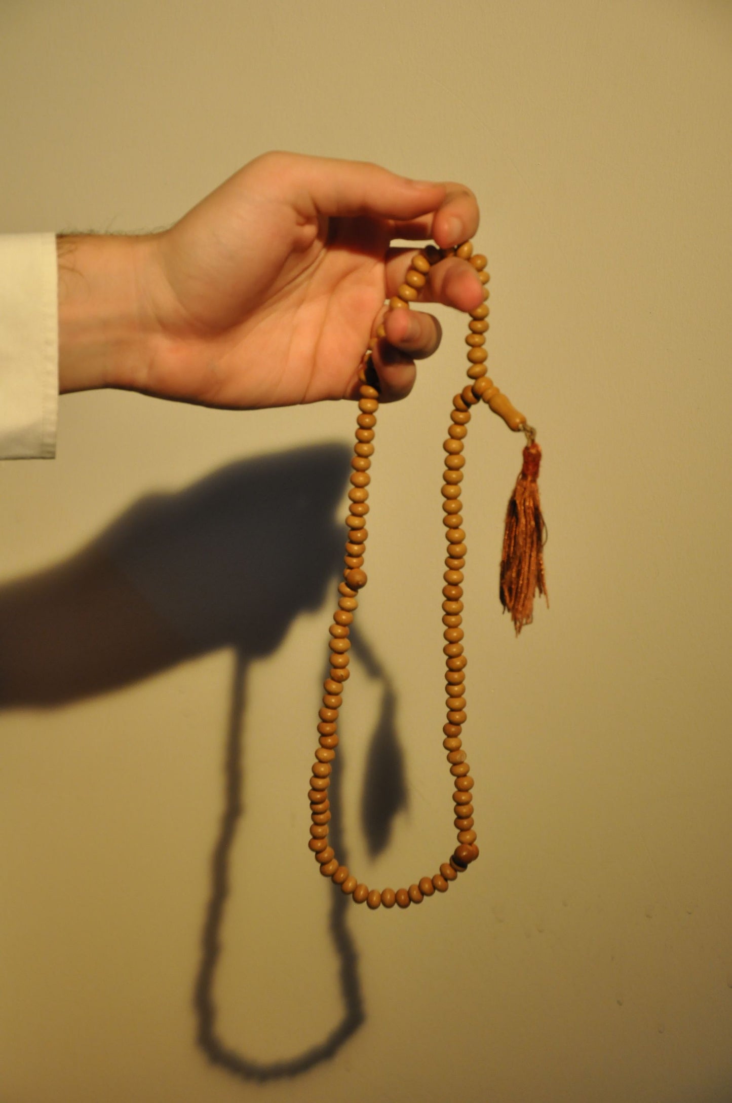 Kuka wood tasbih in hand