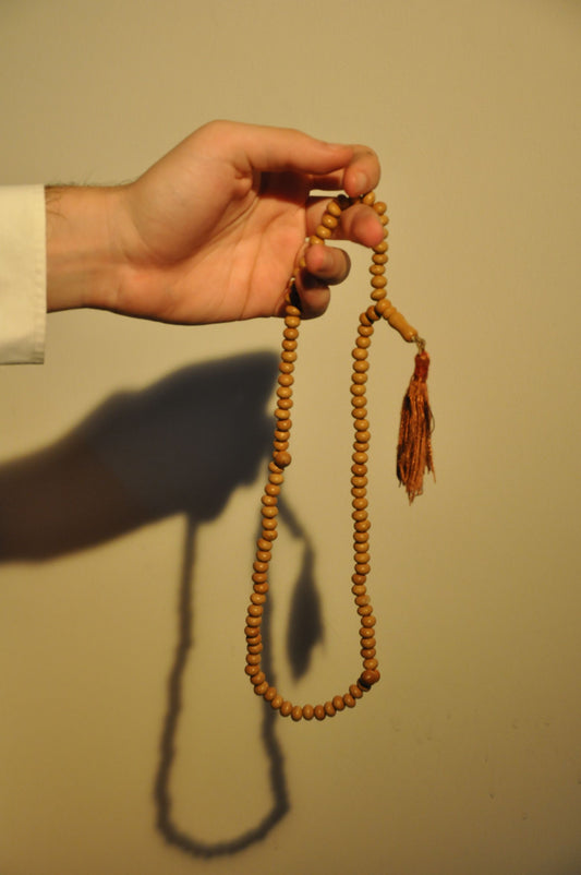 Kuka wood tasbih in hand